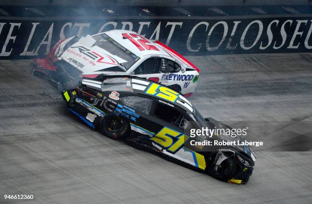 Ryan Blaney, driver of the REV Ford, and Harrison Rhodes, driver of the Industrial Construction Experts Inc. Chevrolet, are involved in an on-track...