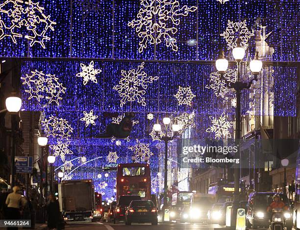 Christmas lights illuminate Regent Street in London, U.K., Tuesday, November 21, 2006.