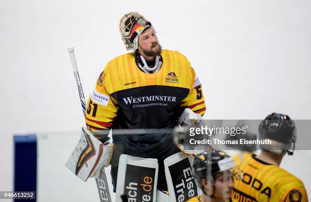 Germany's goalie Timo Pielmeier reacts during the international ice hockey friendly match between Germany and Slovakia at Energieverbund Arena on...