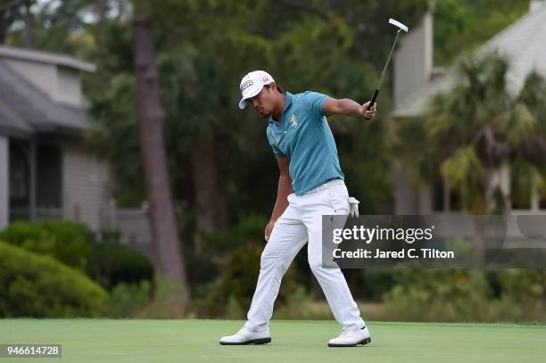 Satoshi Kodaira of Japan reacts after making his birdie putt on the third playoff hole on the 17th green during the final round the 2018 RBC Heritage...