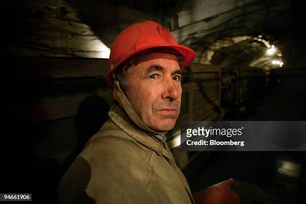 Miner is seen in a tunnel at the Kachkanarsky Vanadium mine, in Nizhny Tagil, Urals, Russia, Friday, July 7, 2006.