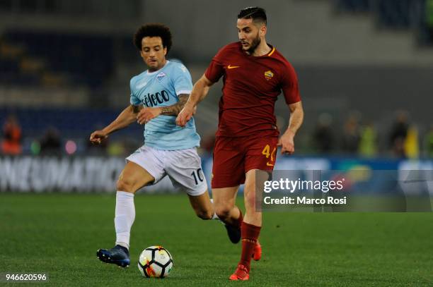 Felipe Anderson Ramos of SS Lazio compete for the ball with Kostas Manolas AS Roma during the serie A match between SS Lazio and AS Roma at Stadio...