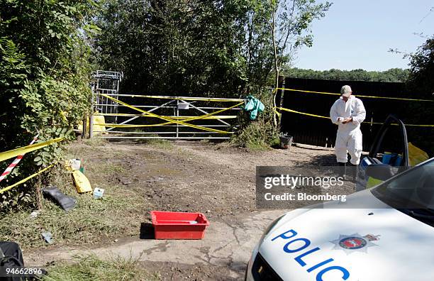 An animal health officer from DEFRA at work on farmland which is infected with foot and mouth near the villages of Wanborough and Normandy, in...