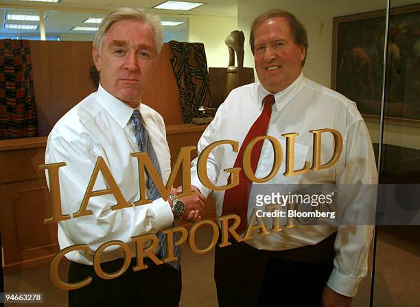 Iamgold Corp. President and Chief Executive Officer Joseph F. Conway, left, and Louis Gignac, president and chief executive officer of Cambior Inc.,...