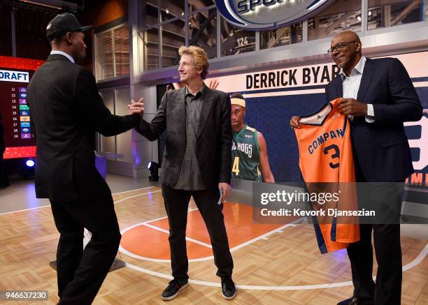 League co-founder Jeff Kwatinetz congratulates Derrick Byars after being picked by 3's Company team during Round 3 with commissioner Clyde Drexler...