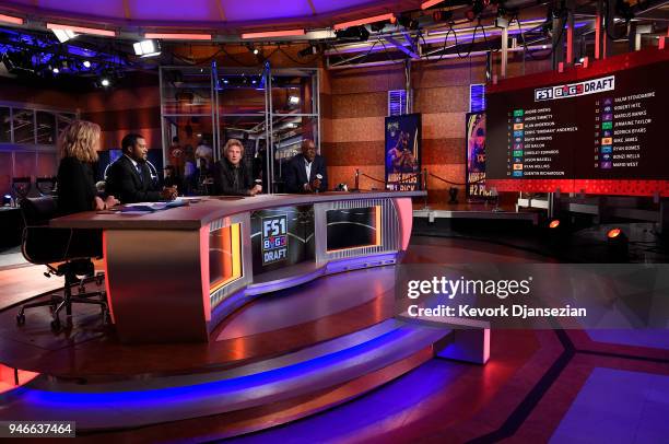 From left to right, Fox Sports host Charissa Thompson BIG3 league co-founders Ice Cube and commissioner Clyde Drexler speak after the conclusion of...