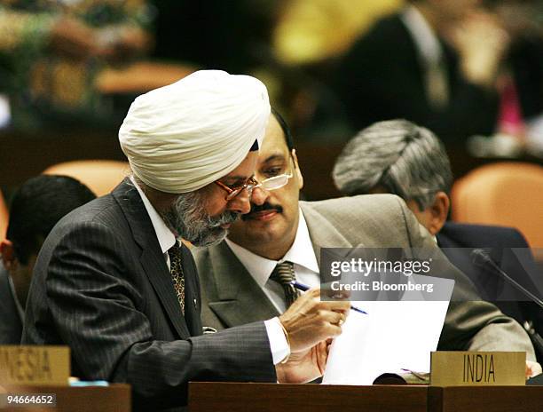 Anand Sharma,India's junior foreign minister, reads some documents during the meeting of foreign ministers at the Summit of the Non-Aligned Countries...