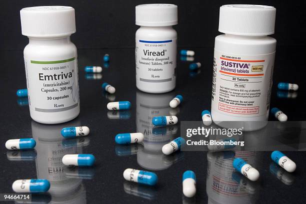 Bottles of AIDS treatments Sustiva, Viread, and Emtriva are shown in a Cambridge, Massachusetts pharmacy among Emtriva pills Wednesday, July 12,...