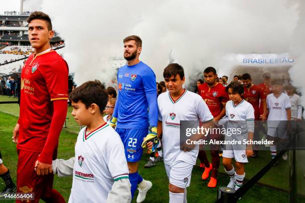 Players of Corinthins and of Fluminense enter the fiield before the match between Corinthinas and Fluminense for the Brasileirao Series A 2018 at...