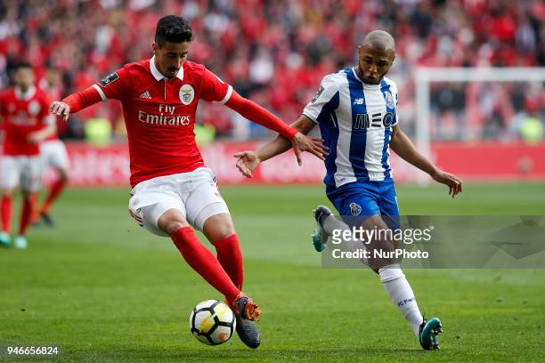 Benfica's defender Andre Almeida vies for the ball with Porto's midfielder Yacine Brahimi during Primeira Liga 2017/18 match between SL Benfica vs FC...