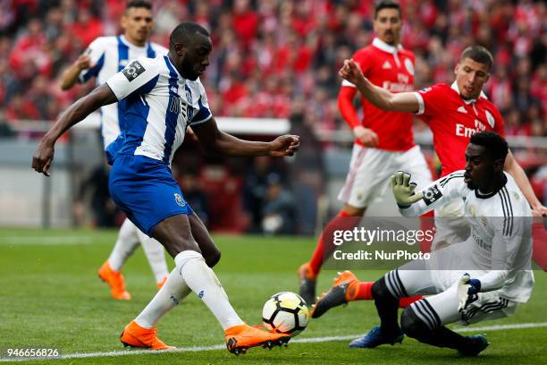 Porto's forward Moussa Marega vies for the ball with Benfica's goalkeeper Bruno Varela during Primeira Liga 2017/18 match between SL Benfica vs FC...