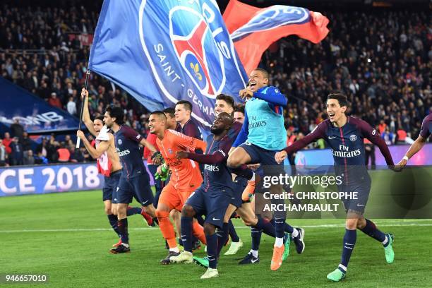 Paris Saint-Germain's Uruguayan forward Edinson Cavani celebrates after scoring a goal during the French L1 football match between Paris...