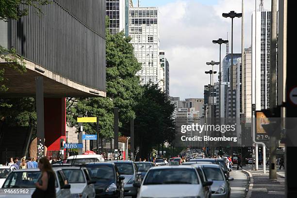 Vehicles drive along Avenida Paulista next to the Sao Paulo Museum of Art in Sao Paulo, Brazil, on Tuesday, Nov. 20, 2007. The museum's collections...