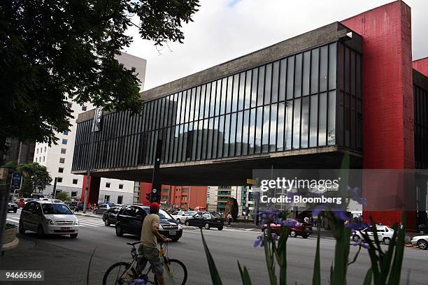 Vehicles drive along Avenida Paulista next to the Sao Paulo Museum of Art in Sao Paulo, Brazil, on Tuesday, Nov. 20, 2007. Pablo Picasso's "Portrait...