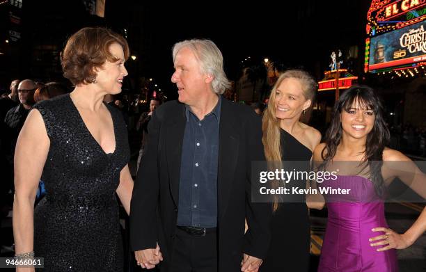 Actress Sigourney Weaver, writer/director James Cameron, actor Sam Worthington and actress Michelle Rodriguez arrive at the premiere of 20th Century...