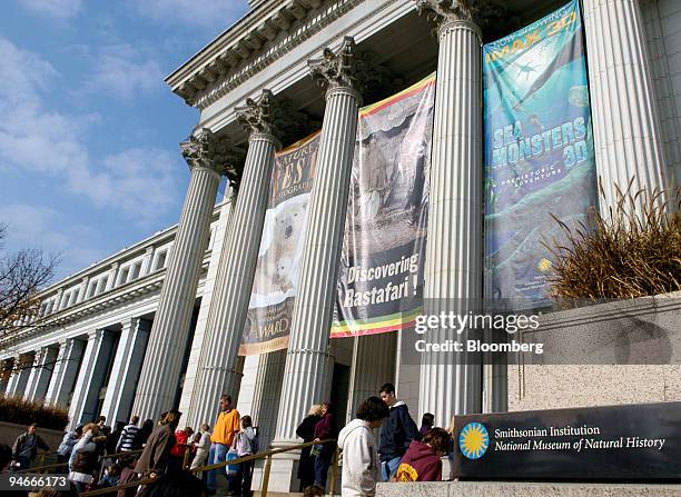 Visitors enter the Smithsonian Institution's National Museum of Natural History in Washington, D.C., U.S., on Tuesday, Nov. 20, 2007. The Smithsonian...
