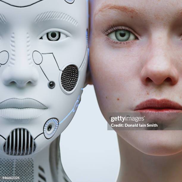 female robot and human heads side by side - cyborg fotografías e imágenes de stock