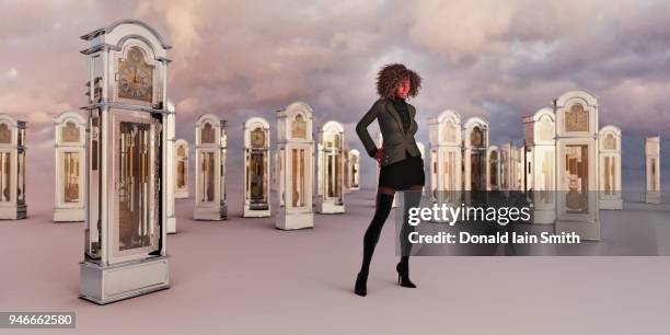time: woman stands among multiple grandfather clocks - multiple same person stock pictures, royalty-free photos & images