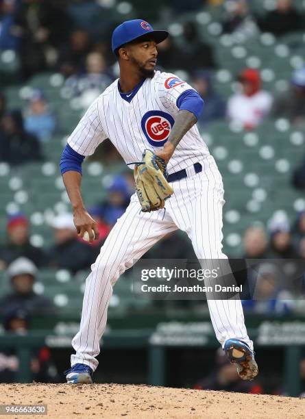 Carl Edwards Jr. #6 of the Chicago Cubs piches against the Atlanta Braves at Wrigley Field on April 13, 2018 in Chicago, Illinois. The Braves...