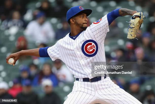 Carl Edwards Jr. #6 of the Chicago Cubs piches against the Atlanta Braves at Wrigley Field on April 13, 2018 in Chicago, Illinois. The Braves...