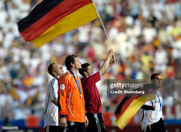 German national team goalkeeper Jens Lehmann, foreground, celebrates with teammates after Germany won the Germany versus Portugal 2006 FIFA World Cup...