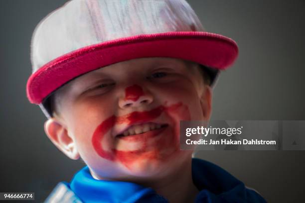 little boy with a painted clown face - clown face paint stock pictures, royalty-free photos & images