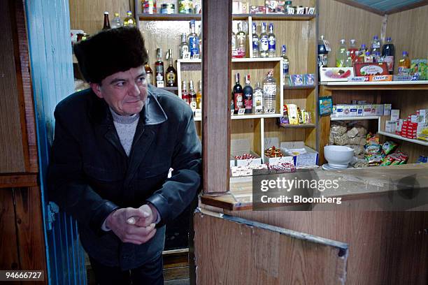 Leonid Ceban waits for customers in his store in Cosnitsa, a village on the left bank of the Dnestr River in "no-man's land," at the Transdnestrian...