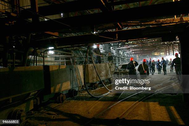 Miners walk toward the entrance of a mine shaft at the Kachkanarsky Vanadium mine, in Nizhny Tagil, Urals, Russia, Friday, July 7, 2006.