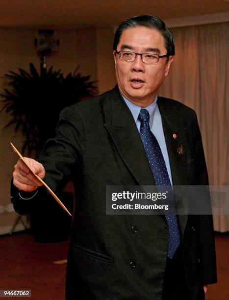 Ong Keng Yong, secretary-general for the Association of South-East Asian Nations , arrives for an informal working dinner with leaders of the 13th...