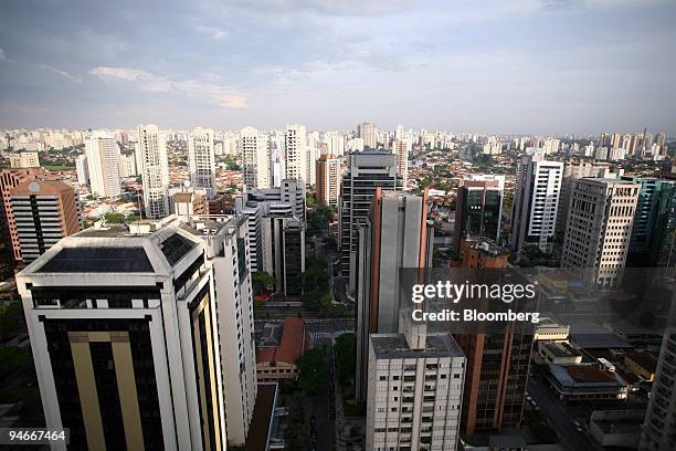 The sun reflects off buildings in the Itaim Bibi district in Sao Paulo, Brazil, seen on Sunday, Nov. 18, 2007. Brazil is newly developing a public...