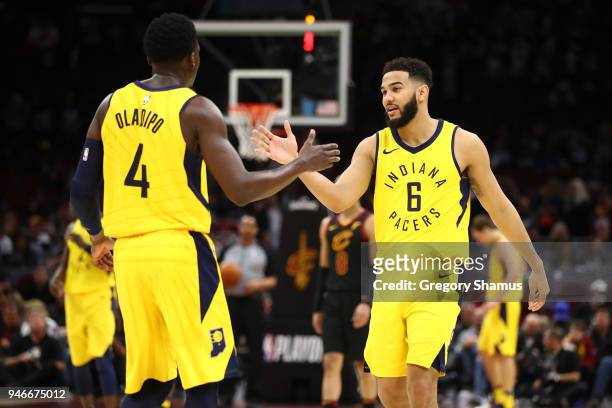 Cory Joseph of the Indiana Pacers celebrates during the fourth quarter with Victor Oladipo while playing the Cleveland Cavaliers in Game One of the...