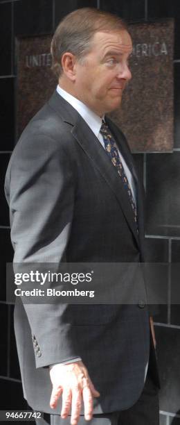 Jeffrey Skilling, former Enron Corp. Executive, front, leaves the Bob Casey Federal Courthouse, in Houston, Texas, Monday, April 17, 2006. Skilling...
