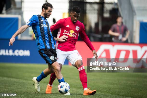 Ignacio Piatti of Montreal Impact tries to get past Michael Murillo of New York Red Bulls during the Major League Soccer match between Montreal...