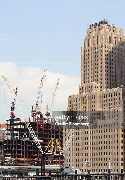 Cranes fill the sky above construction sites for the new Goldman Sachs headquarters, background left, and the Freedom Tower, foreground, in Lower...