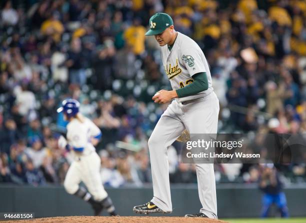 Sean Manaea of the Oakland Athletics reacts after giving up a home run to Taylor Motter of the Seattle Mariners in the fifth inning at Safeco Field...