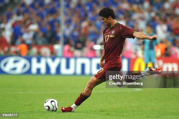 Cristiano Ronaldo of Portugal takes a free kick during the team's 1-0 defeat by France in a semifinal match at the 2006 FIFA World Cup in Munich,...