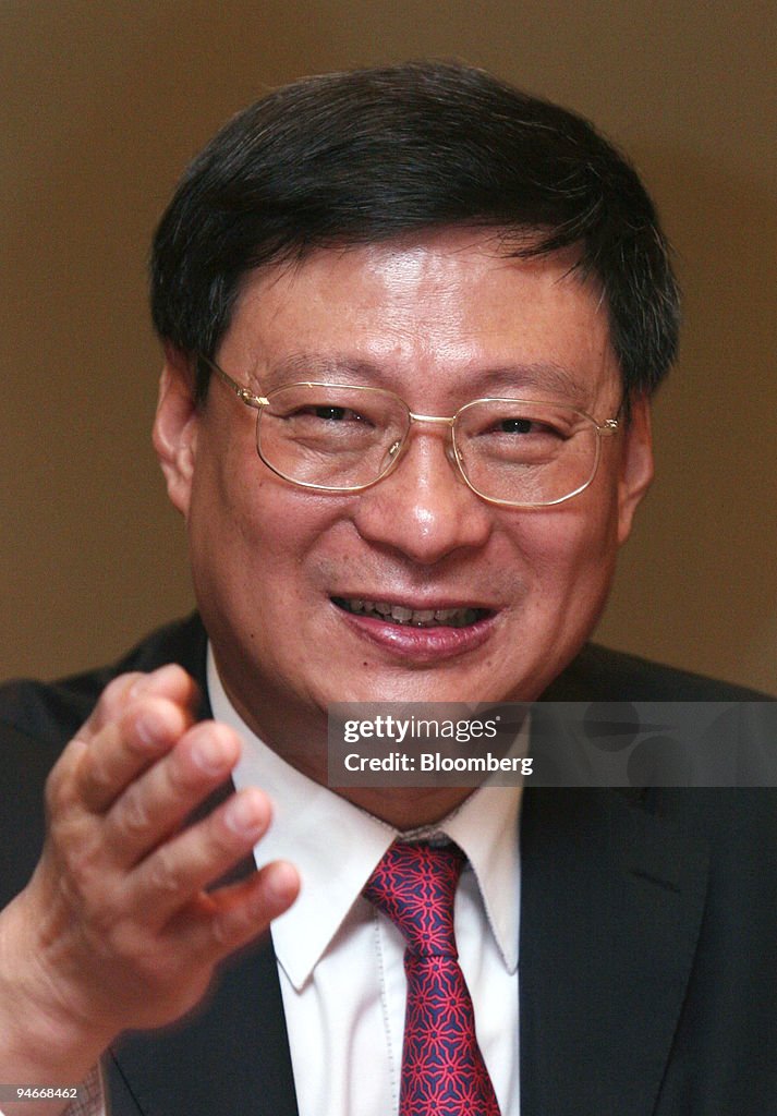 Li Lihui Bank of China President Li Lihui gestures during the first day of ...