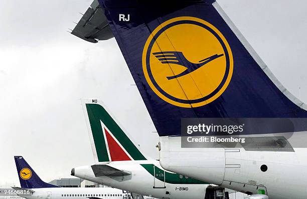 Lufthansa and Alitalia airplanes are parked on the tarmac at Geneva airport, in Switzerland, on Thursday, Nov. 15, 2007. Luftansa are interested in...