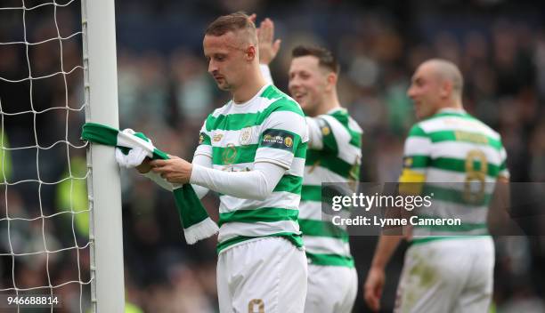 Leigh Griffiths of Celtic ties a scarf to the post after the Scottish Cup Semi Final between Rangers and Celtic at Hampden Park on April 15, 2018 in...