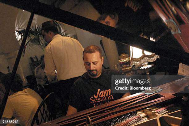 Pianist plays 'As time goes by' at Rick's Caf? in Casablanca, Morocco, on Thursday, July 26, 2007. The midnight fog rolls off the Atlantic, wrapping...