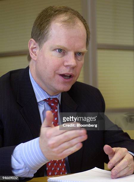 Walter Borst, treasurer of General Motors Corp., gestures during an interview at the General Motors Building in New York on Tuesday, April 11, 2006.