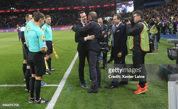 Head coach Unai Emery of Paris Saint-Germain greets Leonardo Jardim of AS Monaco during the Ligue 1 match between Paris Saint Germain and AS Monaco...