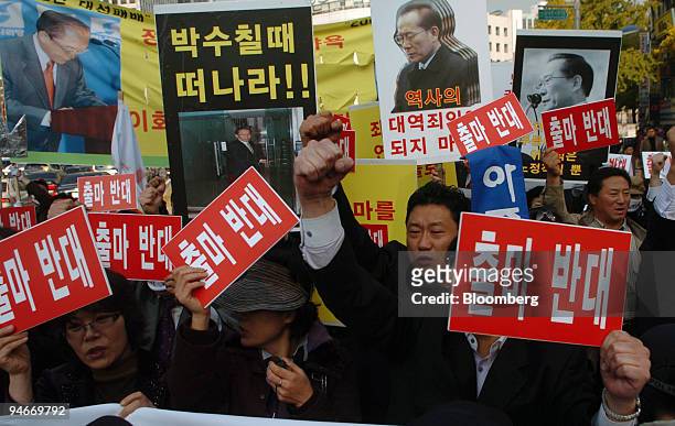 Protesters demonstrate against Lee Hoi Chang, a former leader of the South Korean major opposition Grand National Party, in Seoul, South Korea, on...