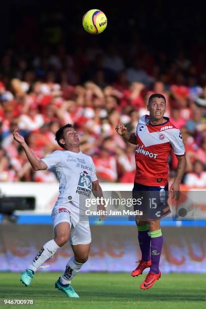 Miguel Herrera of Leon and Carlos Esquivel of Veracruz fight for the ball during the 15th round match between Veracruz and Leon as part of the Torneo...