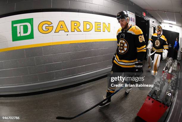 David Pastrnak of the Boston Bruins walks to the ice for warmups before the game against the Toronto Maple Leafs during the First Round of the 2018...