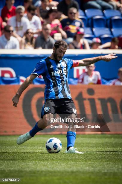Ignacio Piatti of Montreal Impact clears the ball during the Major League Soccer match between Montreal Impact and New York Red Bulls at Red Bull...