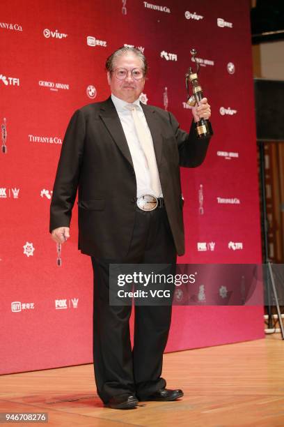 Martial artist Sammo Hung poses with the Best Action Choreography trophy at backstage of the 37th Hong Kong Film Awards ceremony at Hong Kong...