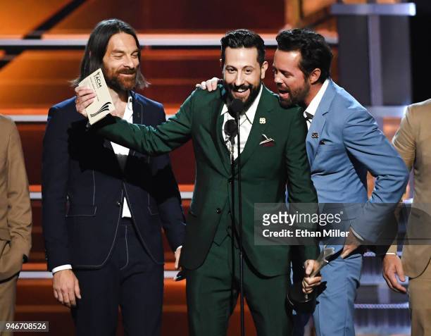 Geoff Sprung, Matthew Ramsey and Brad Tursi of musical group Old Dominion accept the Vocal Group of the Year award onstage during the 53rd Academy of...