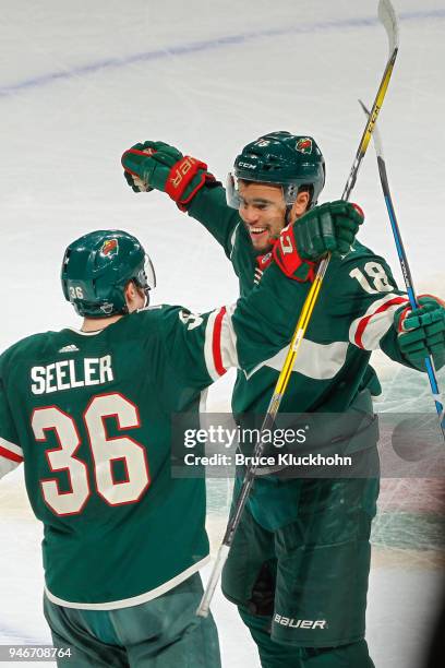 Jordan Greenway celebrates his goal with teammate Nick Seeler of the Minnesota Wild against the Winnipeg Jets in Game Three of the Western Conference...