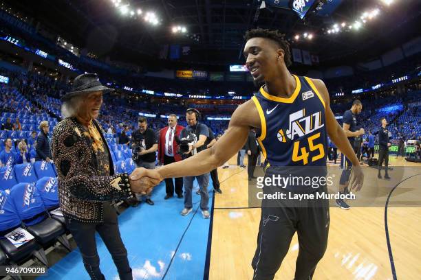 James Goldstein shakes hands with Donovan Mitchell of the Utah Jazz before the game against the Oklahoma City Thunder during Game One of Round One of...